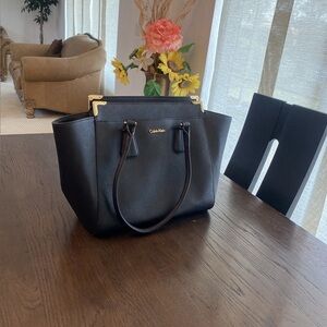 Calvin Klein Elegant Black Tote with Gold Trim